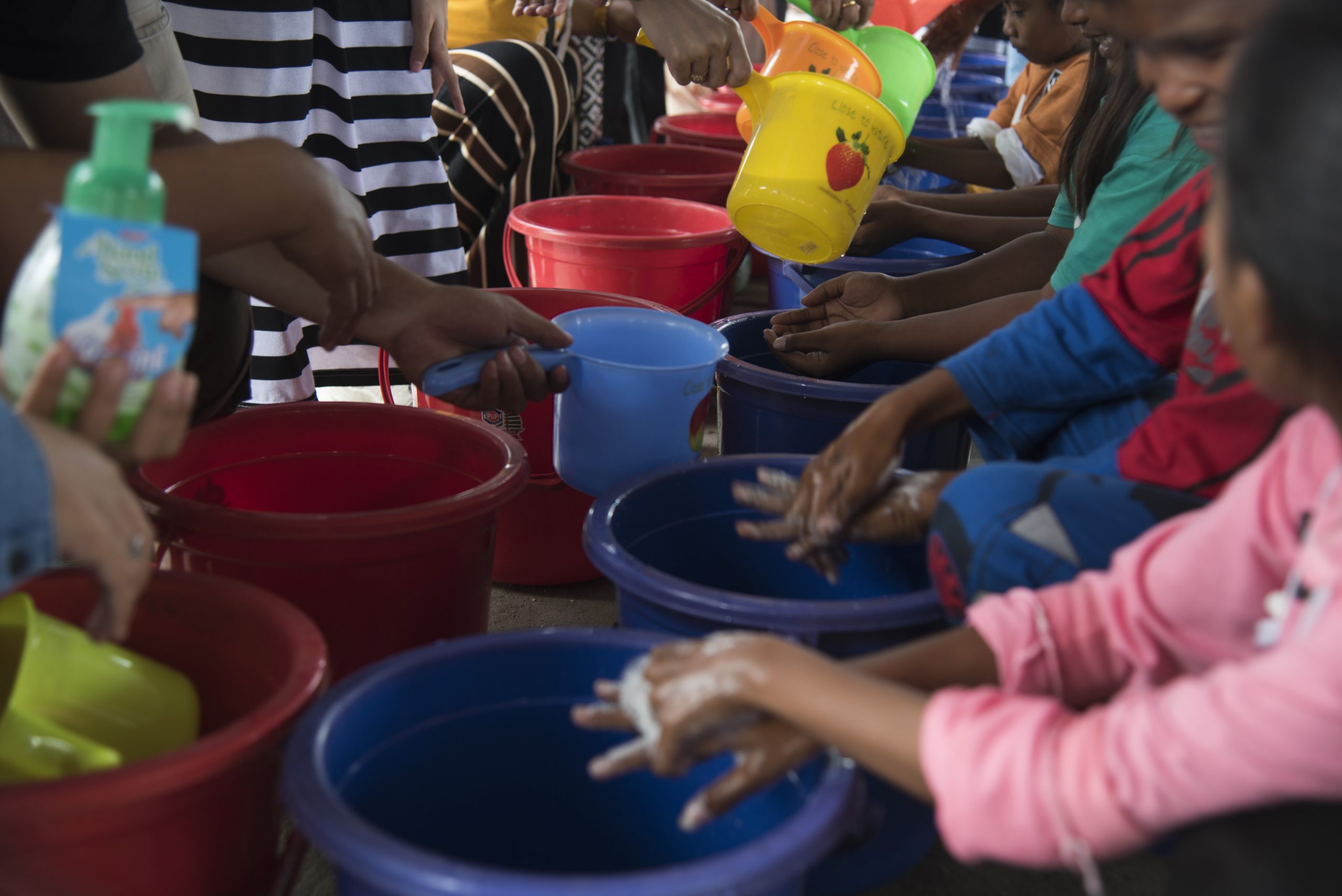 Children participate in a demonstration on good hygiene and handwashing in the aftermath of a powerful earthquake in 2018, in Sulawesi, Indonesia. Credit: Rosa Panggabean / Oxfam